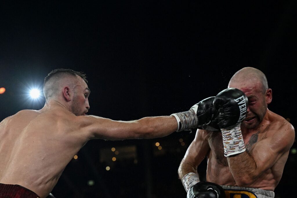 Sam Goodman punching TJ Doheny