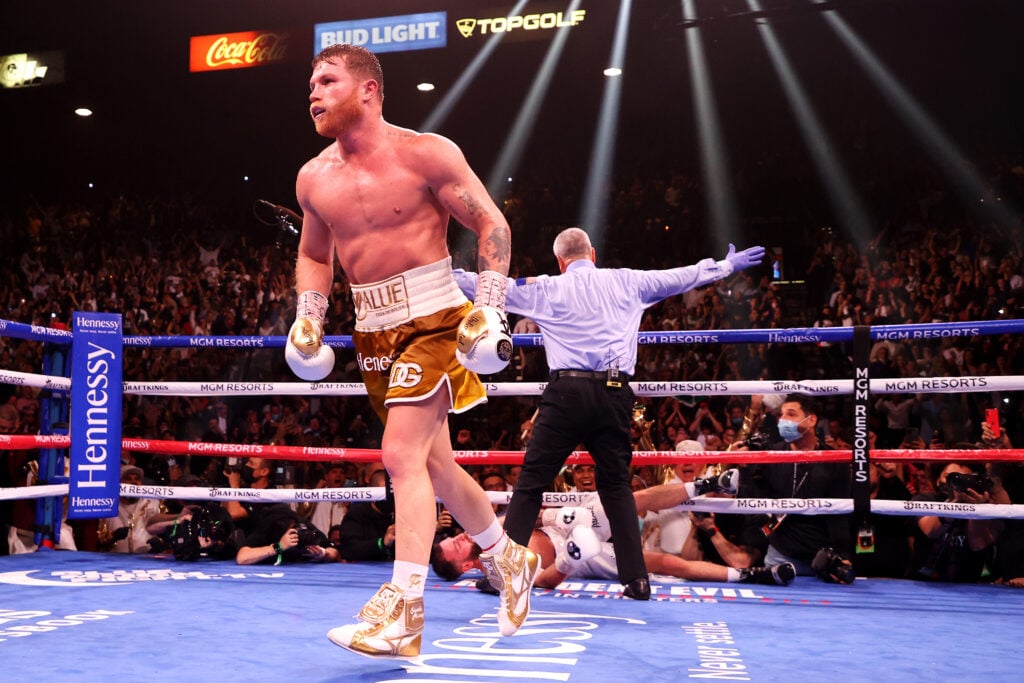 Canelo Alvarez walks away after dropping Caleb Plant