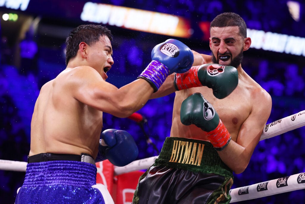 Salt Papi throws a right hand at Slim Albaher