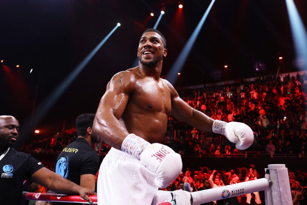 Anthony Joshua celebrates defeating Otto Wallin