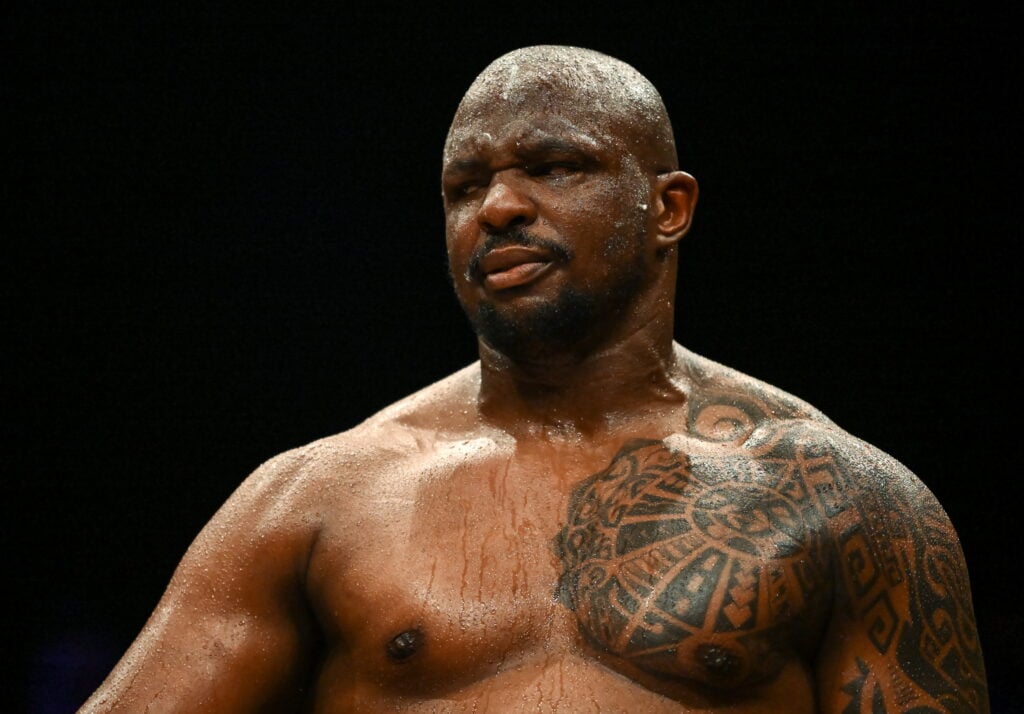 Dillian Whyte looking into distance in boxing ring with nothing in the background