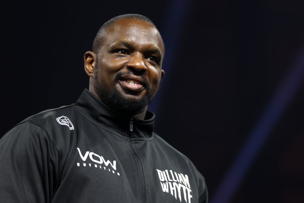 Dillian Whyte looks on at grand arrivals in Saudi Arabia while wearing tracksuit.