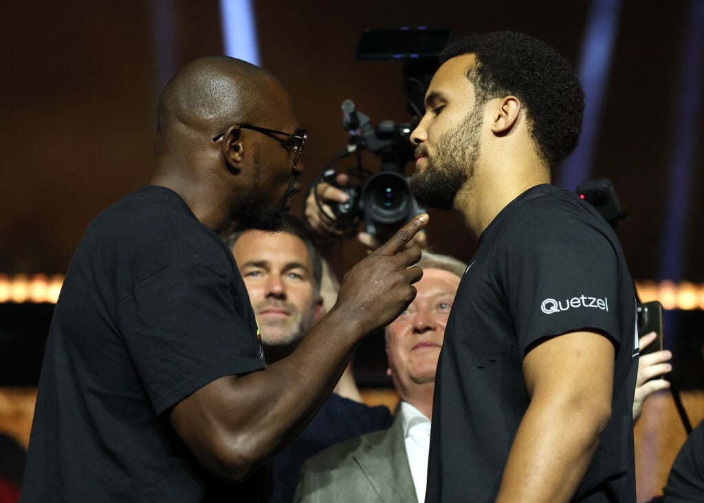 Dillian Whyte points at Moses Itauma during intense face-off