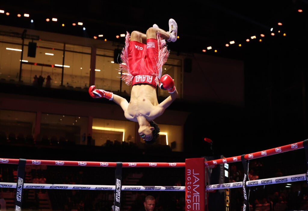 Mohammed Alakel backflips after winning his first fight by stoppage