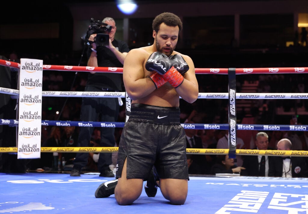 Moses Itauma celebrates on his knees after beating Dillian Whyte