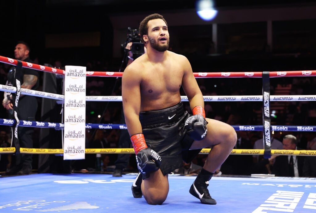 Moses Itauma celebrates in the ring after his knockout win over Dillian Whyte in Riyadh, Saudi Arabia