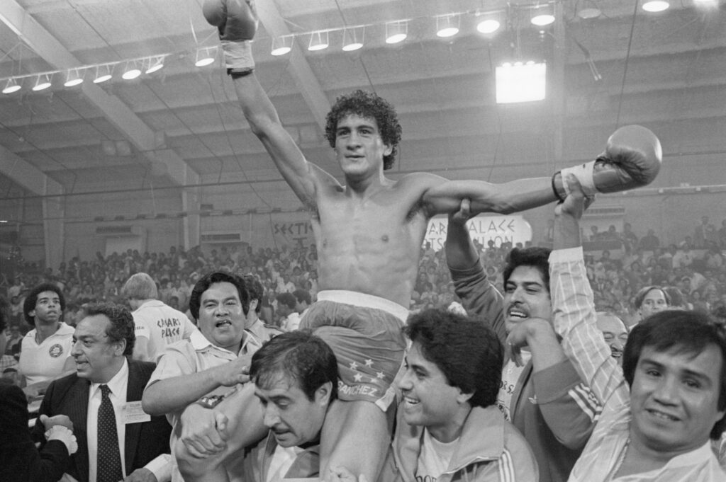 Salvador Sanchez On Shoulders Of Trainer after win over Wilfredo Gomez