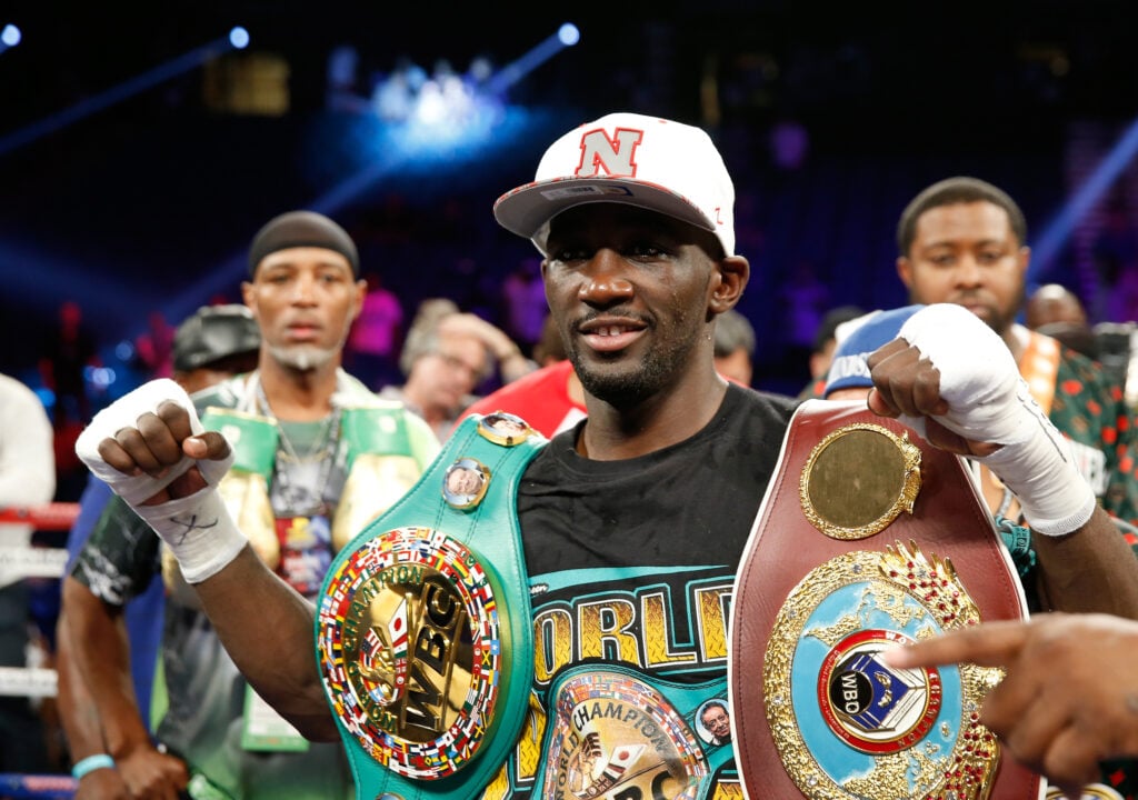 Terence Crawford celebrates defeating Viktor Postol
