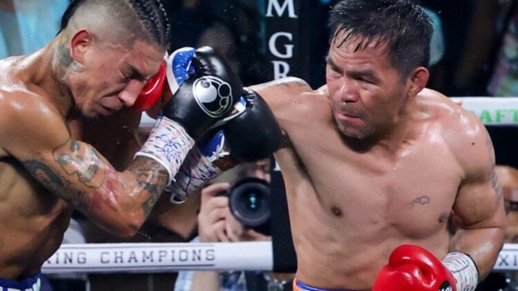 Manny Pacquiao lands a right hand on a shelled up Mario Barrios