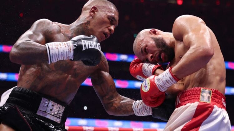 Conor Benn throws a bodyshot left hook at Chris Eubank Jr