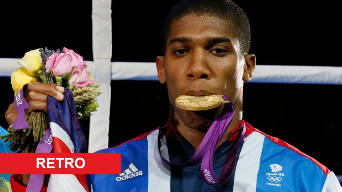 Anthony Joshua celebrates with his gold medal during the award ceremony of the 2012 Summer Olympic Games