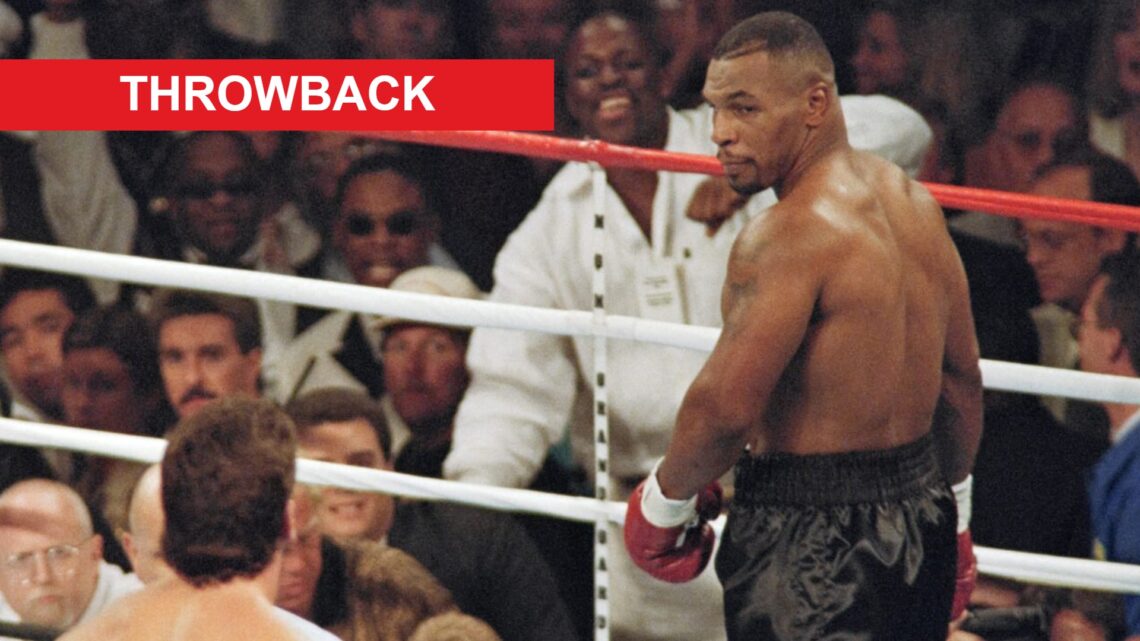 Mike Tyson stares down Peter McNeeley in their 1995 fight