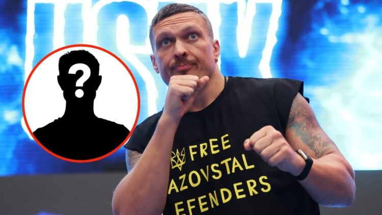 Insert: Mystery Figure Center: Oleksandr Usyk trains during the media workouts ahead of his undisputed heavyweight title fight with Daniel Dubois i...