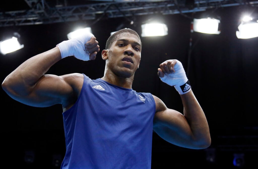 Anthony Joshua celebrates at the 2012 London Olympics