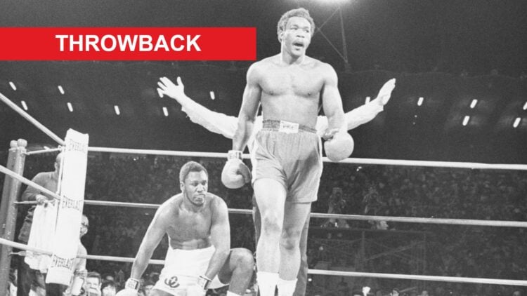 George Foreman walks away after knocking down Joe Frazier