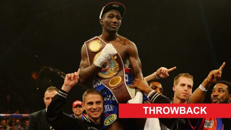 Terence Crawford is lifted on his teams shoulders as he clutches his first world title belt